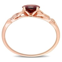 Ovalni prsten od ružičastog zlata od 10 karata s granatom ovalnog reza od 10 karata i dijamantom okruglog reza