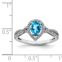 Prsten od čistog srebra s plavim topazom i dijamantom. Karatna težina je 0,19 karata. Težina dragulja-0,85 karata